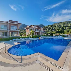 https://golden-golf-sarigerme-villalari.aegeanhotels.net